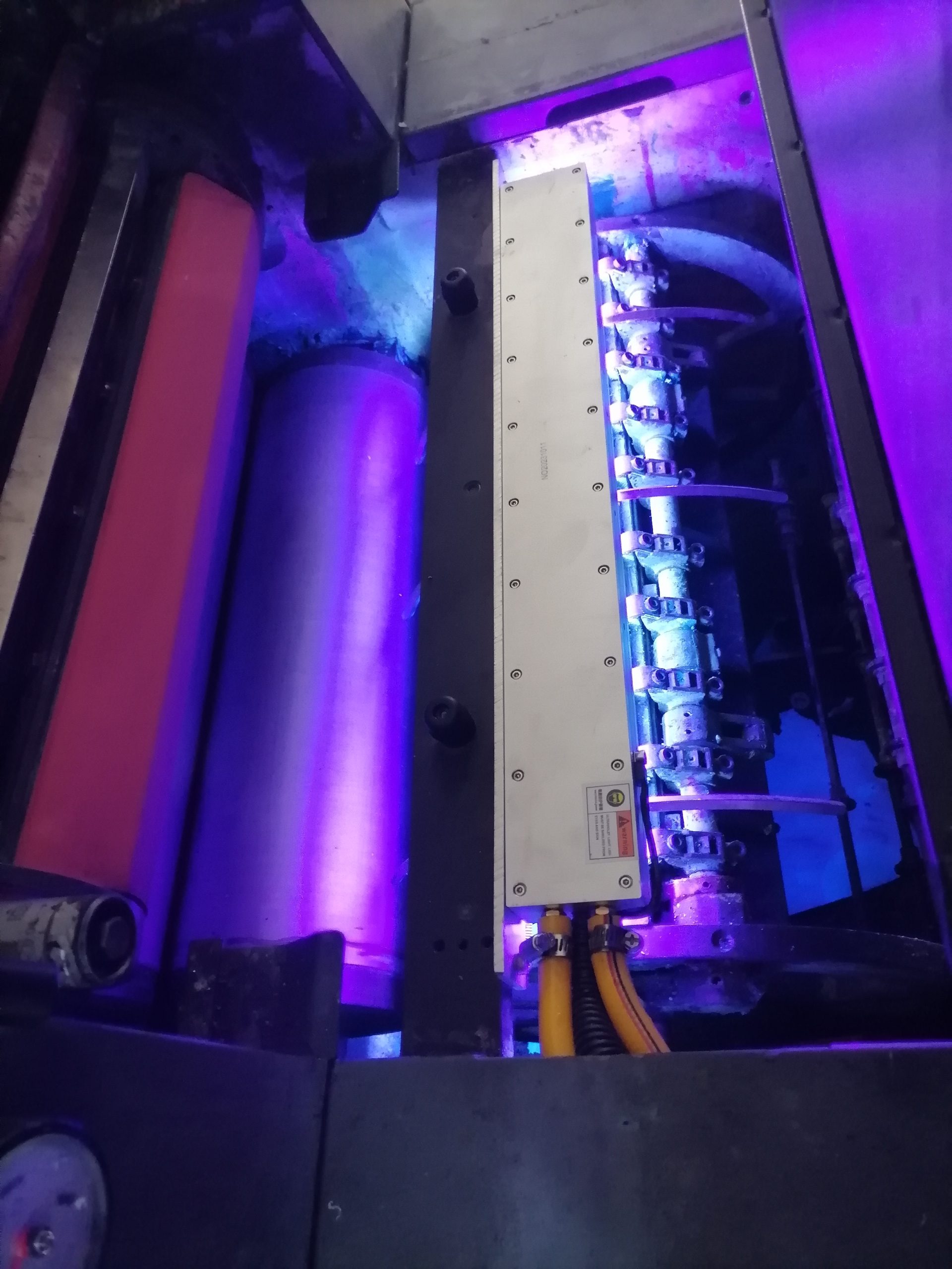 UV LED curing module operating inside an offset printing press