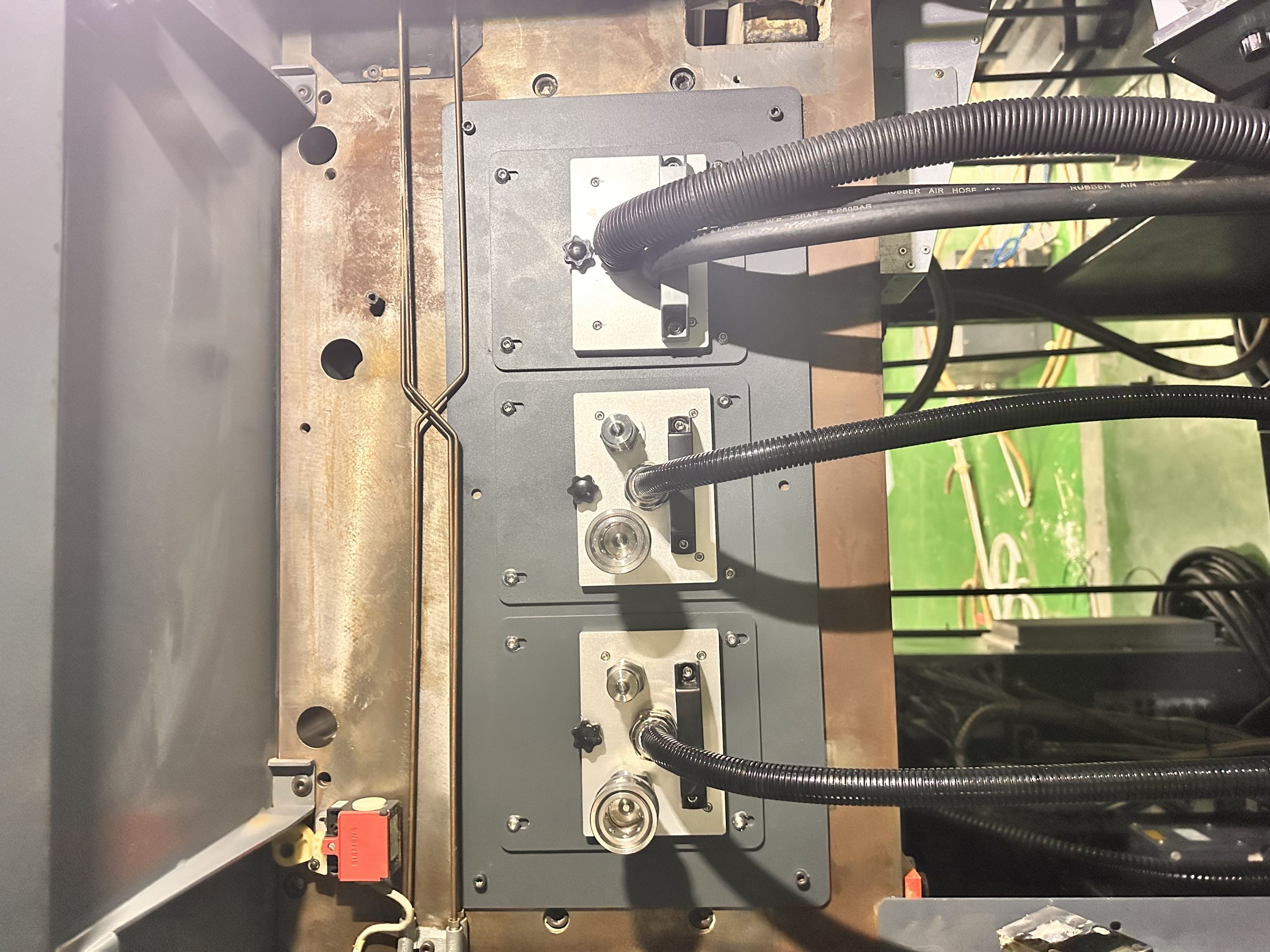 Rear view of UV LED curing modules showing power, air extraction and cooling hose connections.